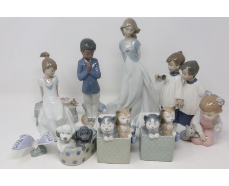 Nine Nao figurines including Play Time 1519, largest H: 26 cm, no chips or cracks. P&amp;P Group 3 (£25+VAT for the first lot