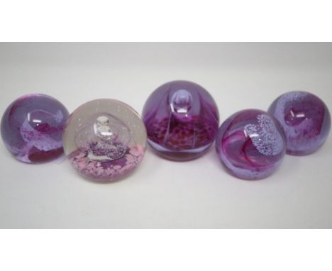 Five paperweights to include Caithness, largest H: 70 mm. P&amp;P Group 1 (£14+VAT for the first lot and £1+VAT for subsequen