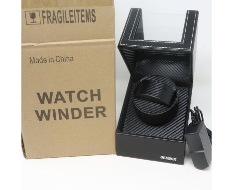 New and boxed Automatic watch winder with power supply. P&amp;P Group 1 (£14+VAT for the first lot and £1+VAT for subsequent 