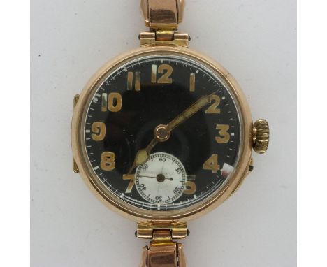 9ct gold ladies wristwatch on a 9ct gold expanding bracelet, overall 26g, not working at lotting. P&amp;P Group 1 (£14+VAT fo