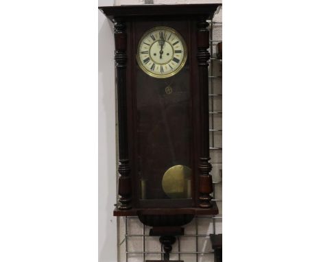 Gustav Becker 19th century mahogany cased Vienna wall clock, twin weight and chiming on a gong, not working at lotting, H: 98