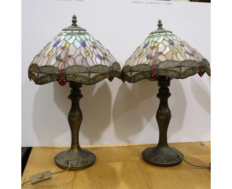 Pair of modern bronzed table lamps with Tiffany style leaded glass shades, each H: 50 cm, one fitting loose. All electrical i