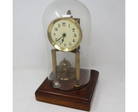 Gustav Becker early 20th century brass anniversary clock beneath a glass dome. Not available for in-house P&amp;P 