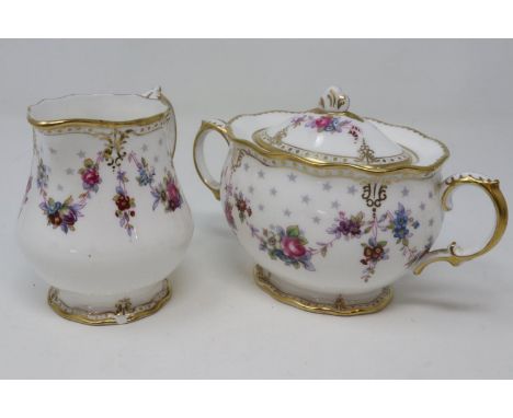 Royal Crown Derby cream and sugar in the Royal Antoinette pattern, chips to bottom of milk jug, largest H: 12 cm. P&amp;P Gro