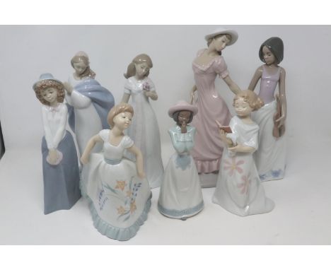 Eight Nao figurines including Elegant Lady, largest H: 32 cm, no cracks or chips. P&amp;P Group 3 (£25+VAT for the first lot 