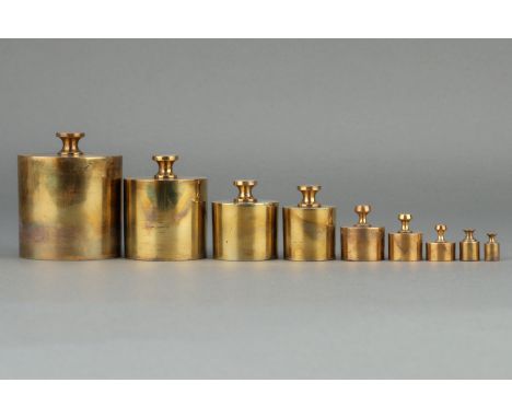 A Set of U.S. Standard Weights, American, c.1900, the large 4lb weight stamped 'H. KOHLBUSCH NEW YORK' and stamped 'U. S. STA