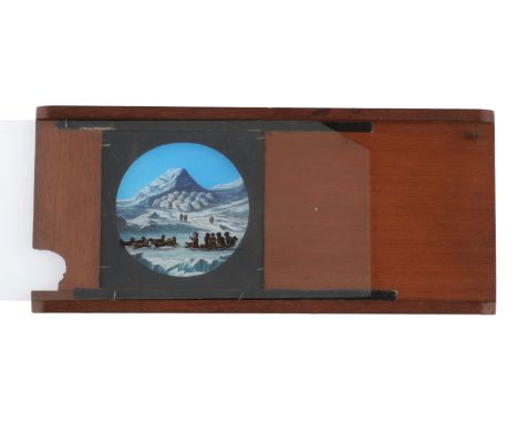 Magic Lantern Arctic Dog Team Wood-framed slip lantern slide showing a snow village with dog team passing through. Very Good