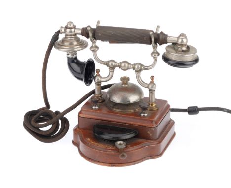 An L.M. Ericsson HA150 Table Top Intercom Telephone,&nbsp;original lable reads 'L. M. ERICSSON &amp; Co STOCKHOLM' with woode