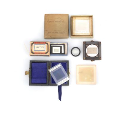 A Speculum Diffraction Grating &amp; Others, a small diffraction gratting engraved on cast speculm in a brass surround, the g