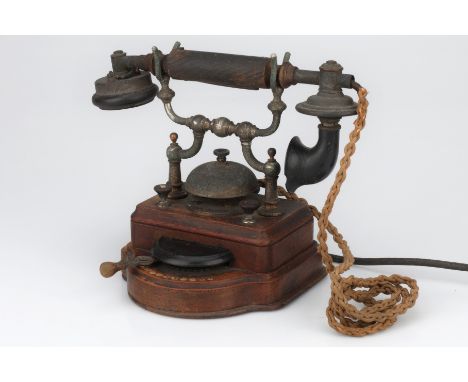 An L.M. Ericsson HA150 Table Top Intercom Telephone wooden base, F, handset is tarnished, buttons and levers operate, handset