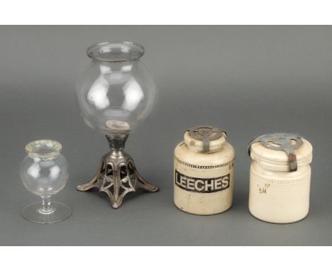 Collection of Leech Jars, including a glass leech jar on a pewter stand, a salt glaze ceramic jar with a fired label for 'LEE