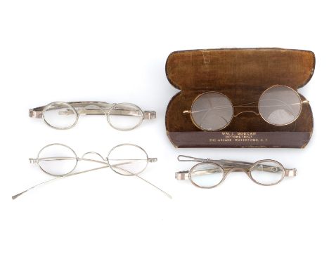 A Group of Spectacles, including, two pairs of 19th Century silver spectacles, unmarked, with oval lenses, C-bridges, telesco