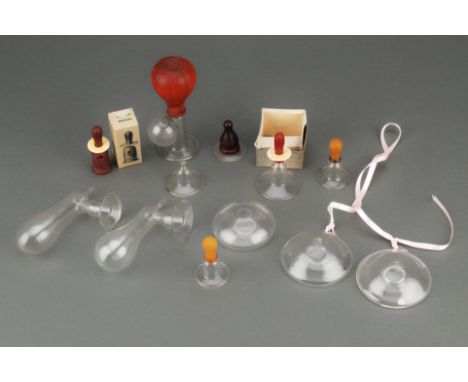 Collection of Glass Breast Pumps and Related Equipment, including hand blown glass breast releaversm, brest pumps and other e