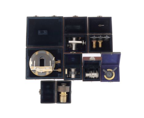 A Collection of Zeiss Microscope Accessories, including a large mechanical stage in a red leather case marked 'KREUTISCH 44 C