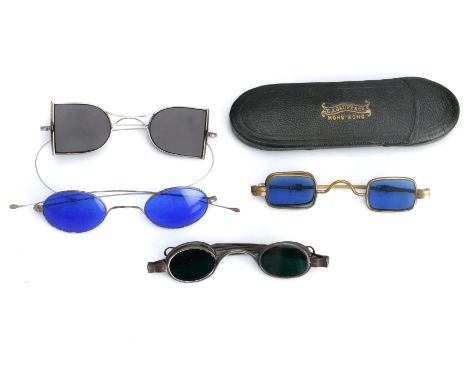 Four Pairs of Late Victorian Spectacles with Coloured Lenses, including: a pair of D-spectacles, with double, D-shaped tinted