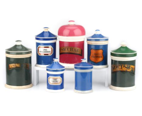 A Collection of 7 Ceramic Apothecary Jars, various forms including 2 Green &amp; Cream medium jars 24cm tall with painted lab