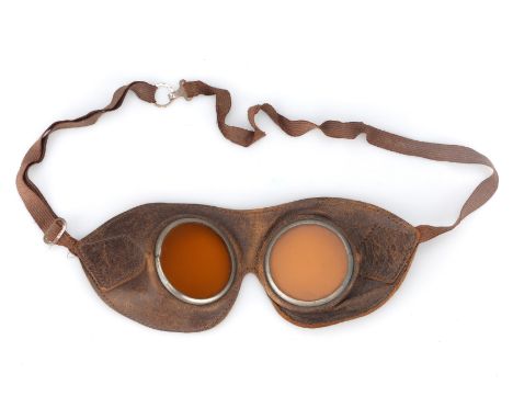 Early/mid 20th Century Amber Lens Goggles, stitched tan leather mask, large circular amber lenses with plated metal rims and 