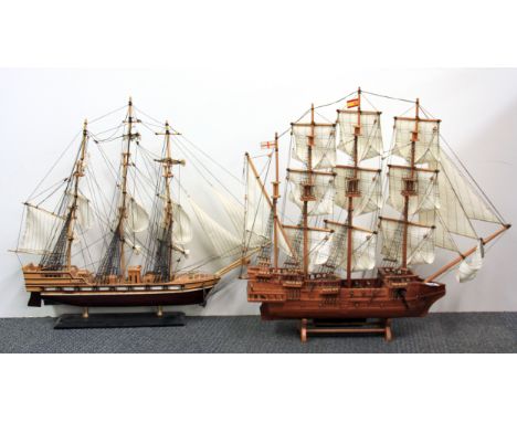 Two wooden model sailing ships, H. 67cm.