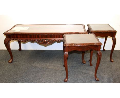 A carved mahogany and glass topped long john coffee table together with two matching wine tables, size 107 x 45 x 42cm.