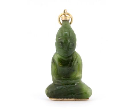 A 9ct yellow gold (stamped 9ct) carved nephrite jade Buddha shaped pendant, L. 4cm.