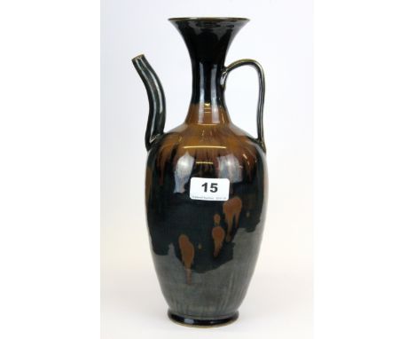 An interesting Chinese Song dynasty style black glazed stoneware wine ewer, H. 31cm.