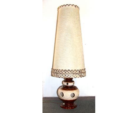 A 1970's ceramic floor lamp and hessian shade, H. 113cm.