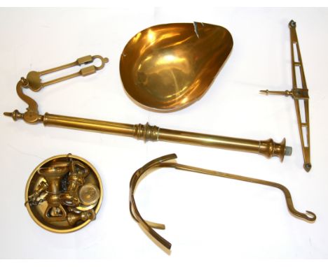 A vintage brass balance scale, H. 58cm, in need of a wooden base.