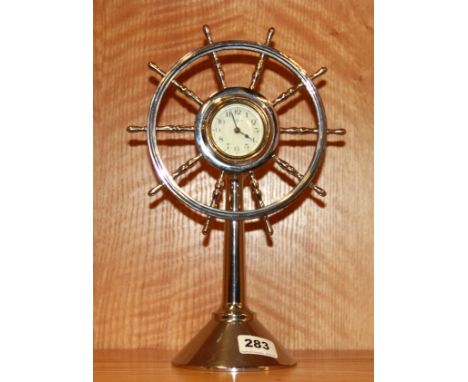 A 1930's chromium plated ships wheel mantle clock, H. 32cm.