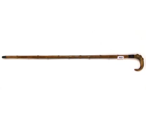 An antique horn handled walking stick.