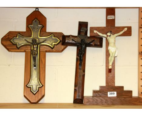Three vintage crucifixes, tallest H. 46cm.
