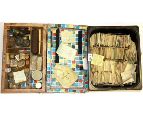 A vintage box of watchmaker's items together with a box of vintage glasses.