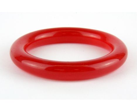 An unusual red jade bangle, Dia. 1.2cm wrist size 6cm.