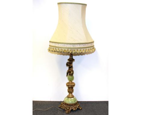 A gilt metal and onyx table lamp and silk shade, H. 99cm.