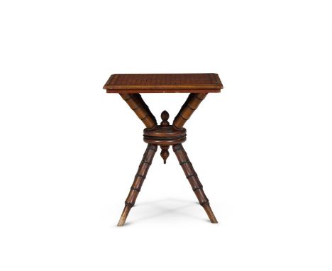 Y  A SATINWOOD AND EBONY GAMES TABLE  CIRCA 1860  The rectangular top inlaid with a 19 x 19 grid for the game 'Go', on simula