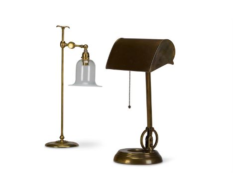 A LATE VICTORIAN BRASS AND VASELINE GLASS STUDENT'S LAMP  CIRCA 1900  The adjustable arm fitted with a Vaseline glass bell-sh