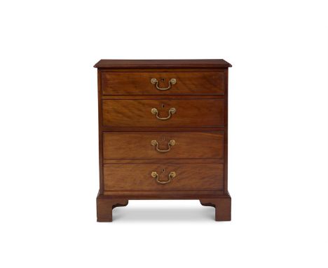 A GEORGE III MAHOGANY COMMODE OR THUNDER BOX  CIRCA 1780 With two drawers above a slide with false drawer fronts revealing a 