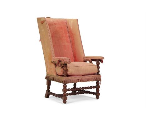 A WALNUT AND RED VELVET UPHOLSTERED ARMCHAIR IN LATE 17TH CENTURY STYLE  LATE 19TH CENTURY With bobbin turned supports throug