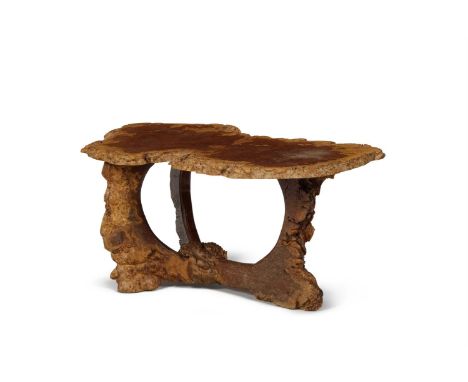 A BURR WOOD LOW OCCASIONAL TABLE  MID 20TH CENTURY  The slice-top with naturalistic edge and polished surface, on conforming 