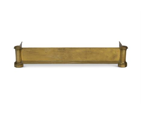 A GOTHIC BRASS KERB FENDER  19TH CENTURY, IN THE STYLE OF/POSSIBLY BY WILLIAM PORDEN With projecting facetted octagonal turre