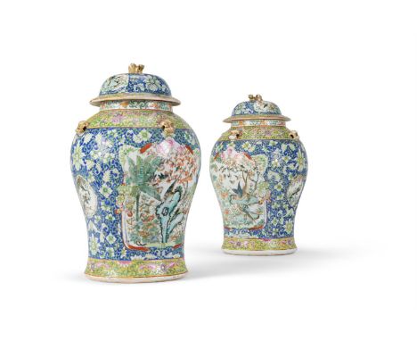 A PAIR OF CANTON PORCELAIN BALUSTER VASES AND COVERS   CHINESE, MID TO LATE 19TH CENTURY Decorated with a wide blue ground ba