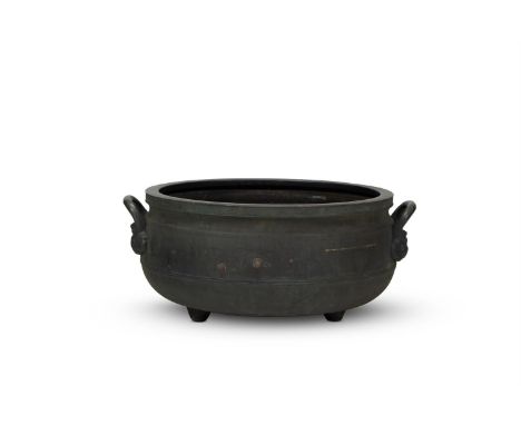 A JAPANESE SILVER APPLIED BRONZE HIBACHI BRAZIER  19TH CENTURY With flanking handles  61cm wide   Condition Report:  With wea