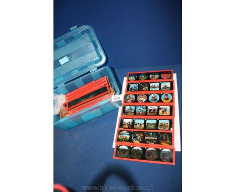 A quantity of hand painted Glass lantern Slides including studies of the Royal Navy, Military, Red Indians, family scenes, et
