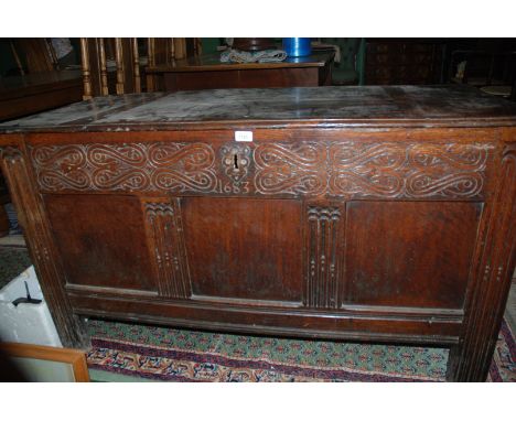 A superb late 17th Oak Coffer, having two plank moulded edge lifting lid on original iron ring hinges, opening to reveal twin