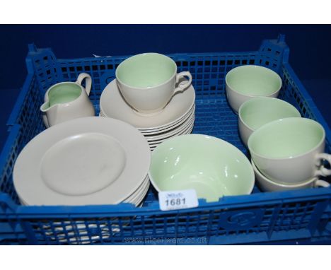 A quantity of Clarice Cliff (Newport Pottery) China including a part tea service in green and cream
