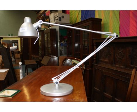 A modern Angle poise Desk Lamp.
