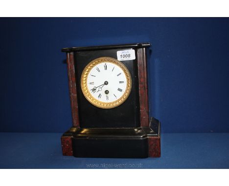 A slate and marble Mantle Clock with enamel face and gilt surround.
