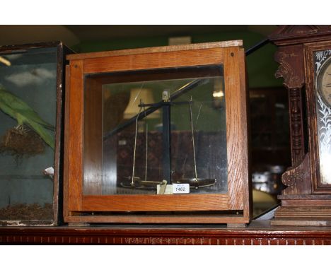 A cased Laboratory/scientific Scales by Philip Harris and Co Ltd.