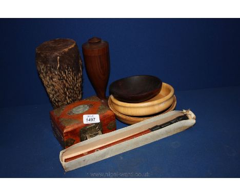 A box of Treen including wooden bowls, recorder, drum, etc.