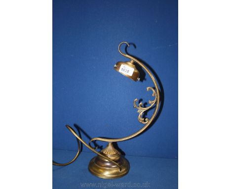 An ornate brass Desk Lamp