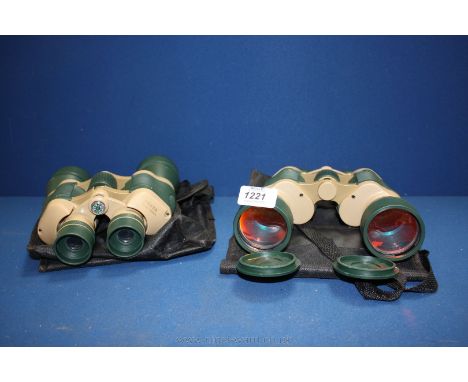 Two pairs of cased Binoculars with ruby coated lens 10 x 50.